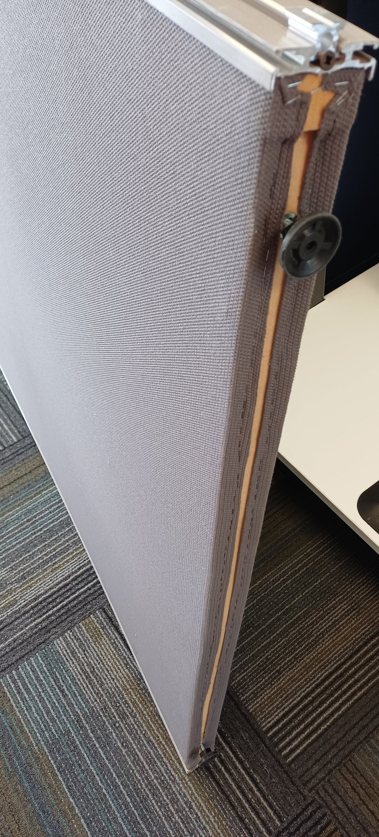 Grey standing partition