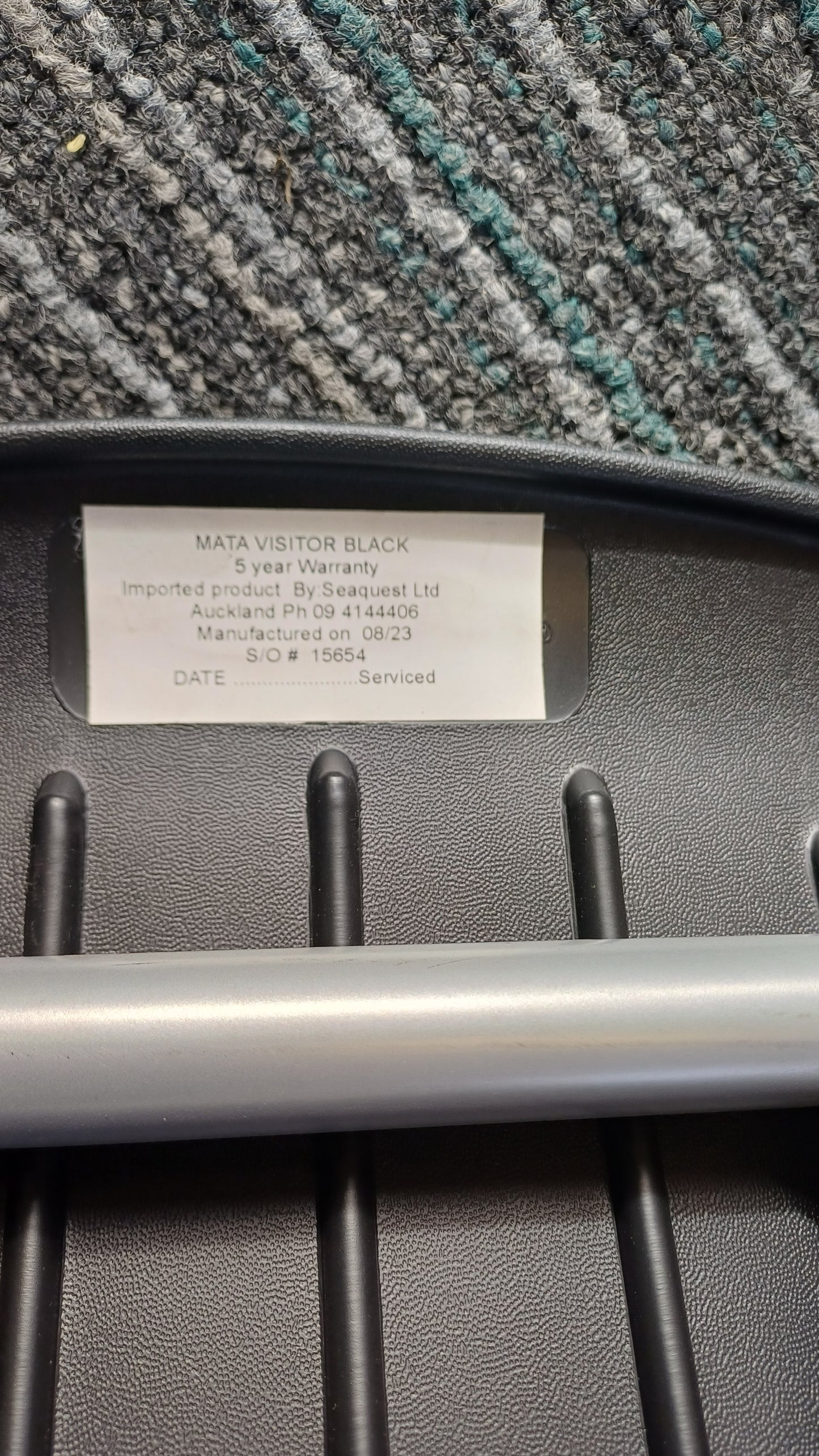 Black plastic reception chair
